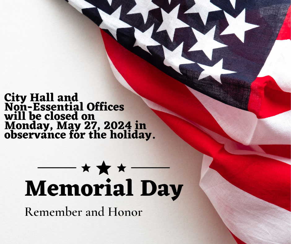 A U.S. flag with text announcing City Hall closure on May 27, 2024, for Memorial Day, emphasizing remembrance.