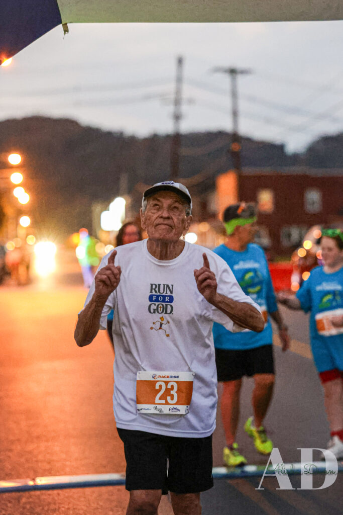 An older man in a white 